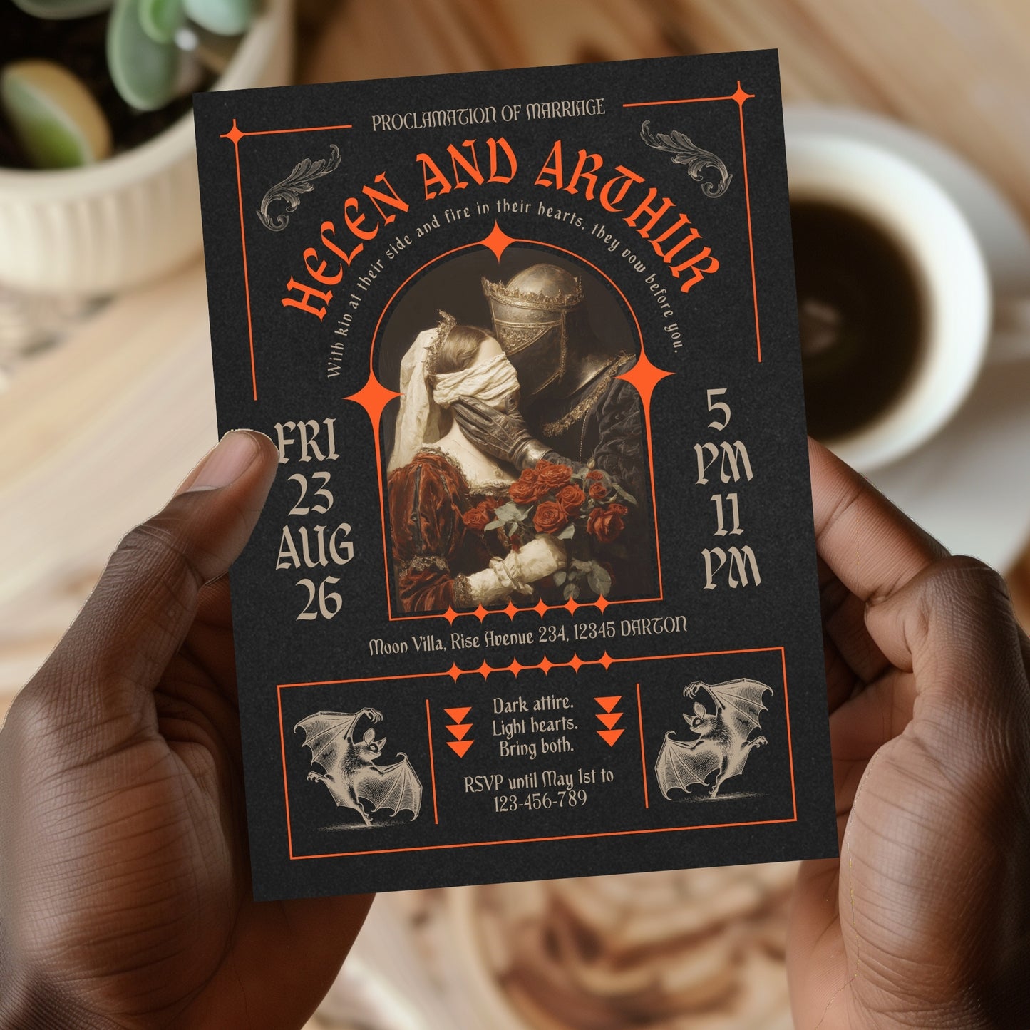 modern brutalism styled Gothic-themed wedding invitation held by a hand with a blurred background